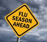Street sign that says flu season ahead.