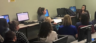 Vanessa Sanderson (far right corner) meets with over 30 of NTI's medical students
